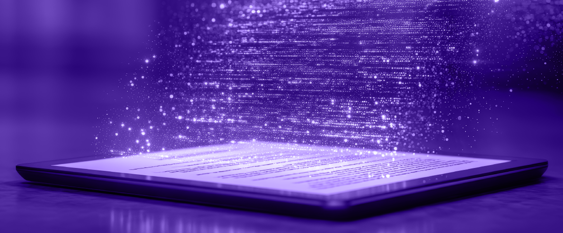 Laptop illuminated by purple light with streams of digital data rising from the screen.