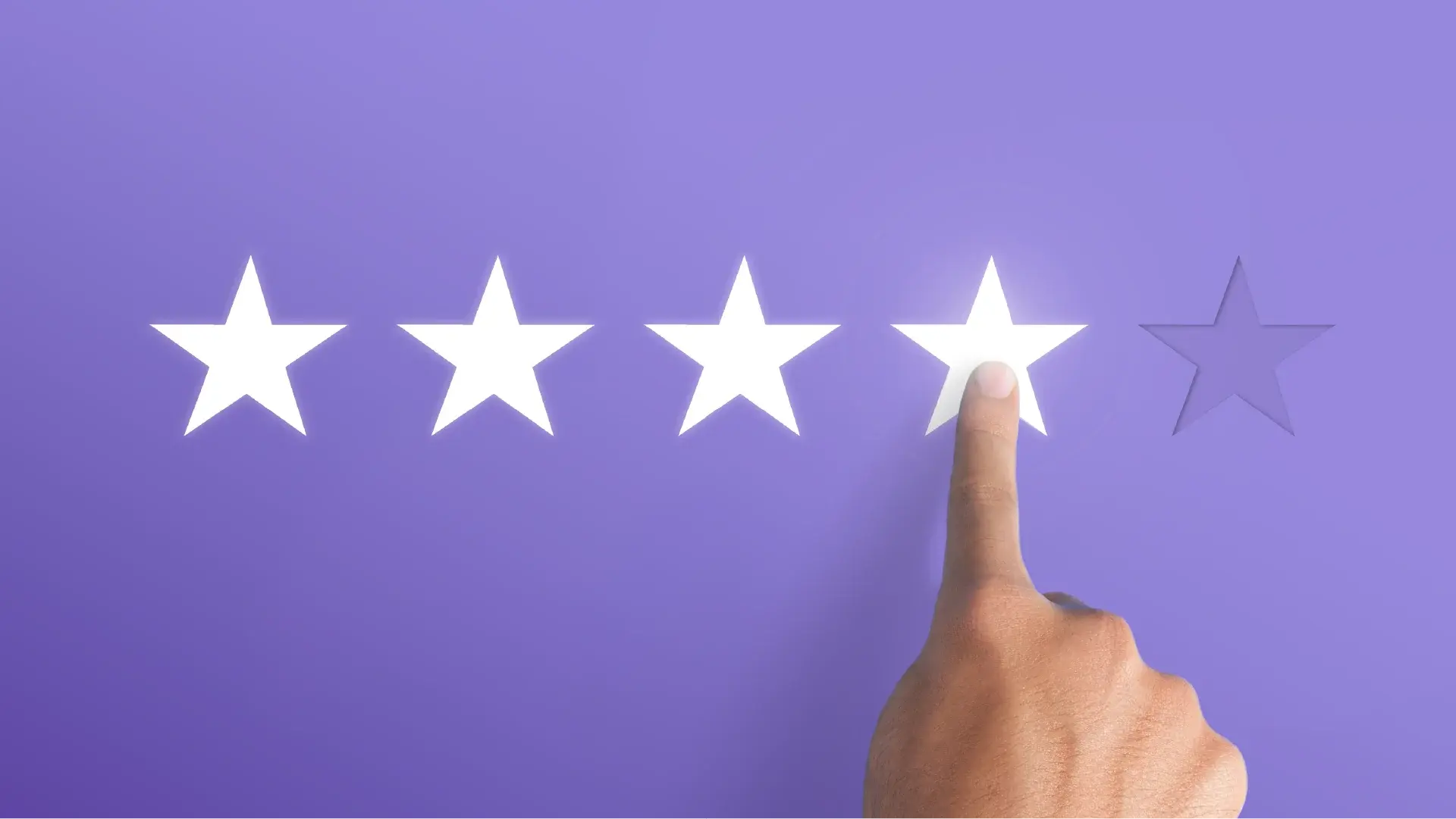 A hand pointing to star icons