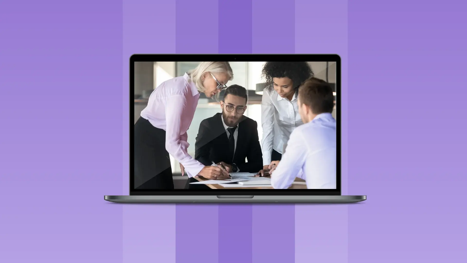 A group deliberating around a desk