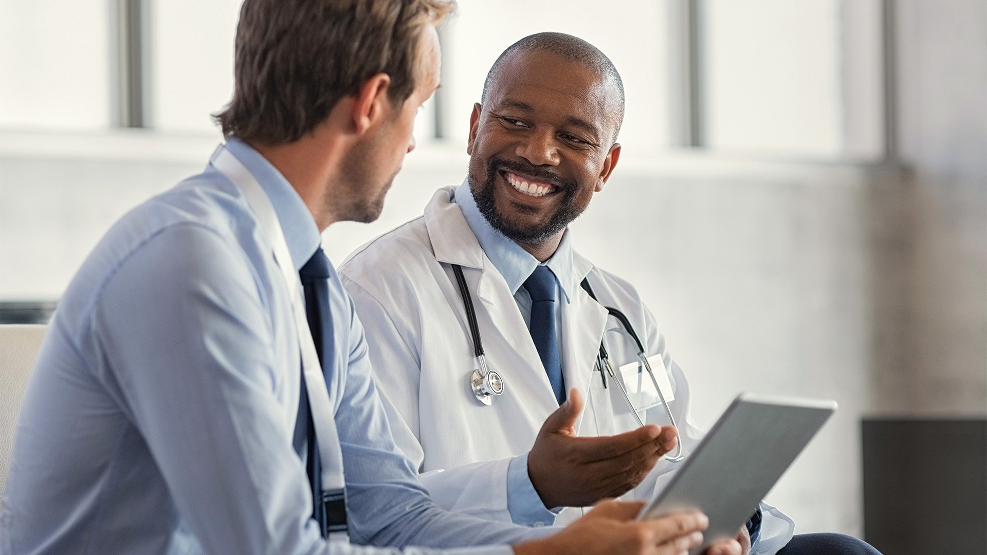 A doctor speaking with a patient